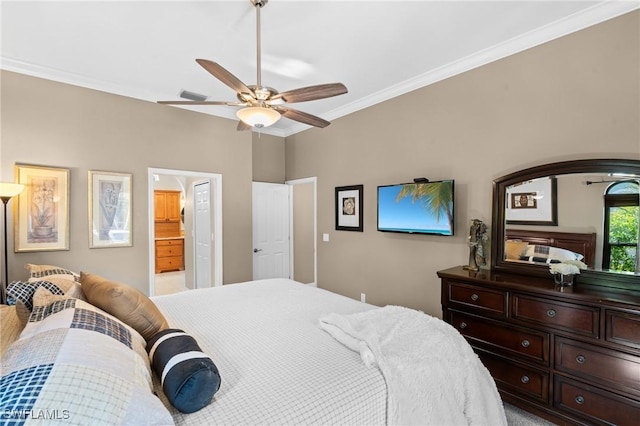 bedroom with ceiling fan, ornamental molding, visible vents, and connected bathroom