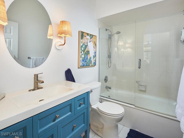 114 Amblewood Ln Unit 9-903, Naples, FL 34105 - bathroom featuring vanity, enclosed tub / shower combo, and tile patterned flooring