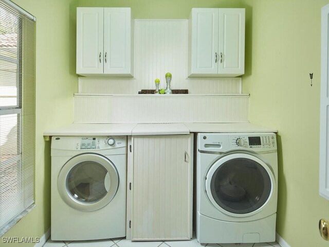 114 Amblewood Ln Unit 9-903, Naples, FL 34105 - washroom with washer / dryer and cabinet space