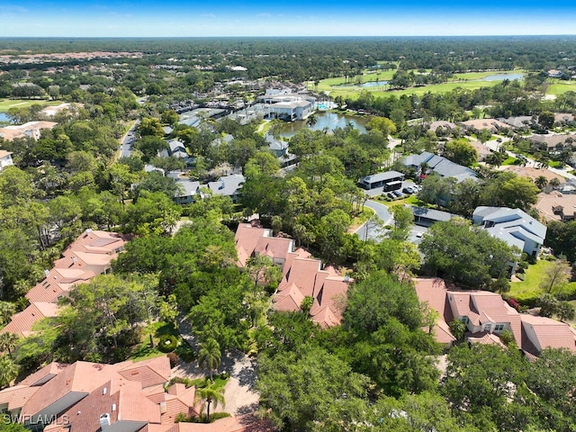 114 Amblewood Ln Unit 9-903, Naples, FL 34105 - aerial view of property and surrounding area featuring a large body of water and nearby suburban area