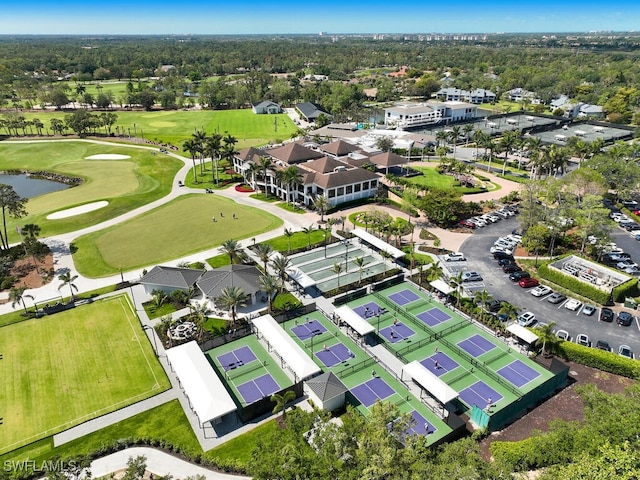 114 Amblewood Ln Unit 9-903, Naples, FL 34105 - aerial view of residential area featuring a local golf course and a nearby body of water