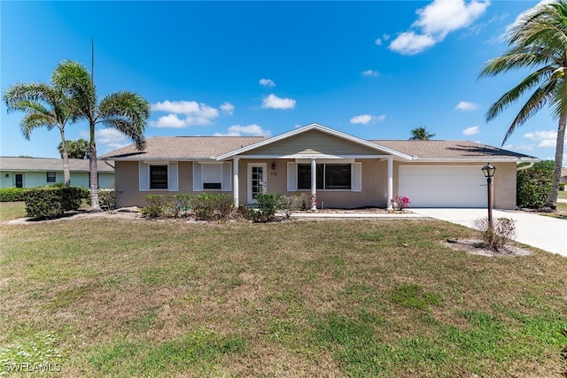 single story home with an attached garage, driveway, stucco siding, and a front lawn