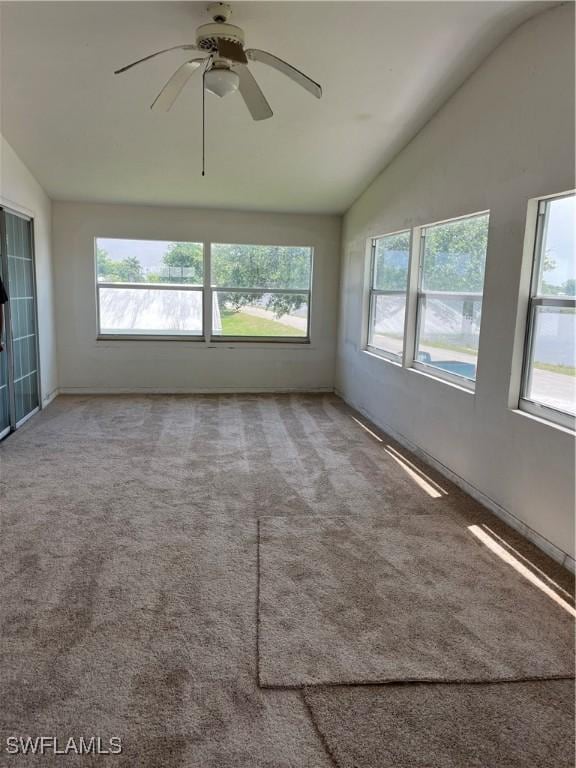901 Thatcher Blvd, Moore Haven, FL 33471 - unfurnished sunroom featuring lofted ceiling and healthy amount of natural light