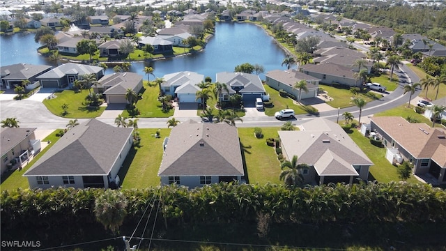 24692 Rio Villa Lakes Cir, Punta Gorda, FL 33950 - aerial view featuring a water view and a residential view