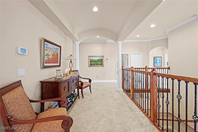 3536 Cherry Blossom Ct Unit 201, Estero, FL 33928 - hallway with ornate columns, recessed lighting, crown molding, light tile patterned flooring, and lofted ceiling