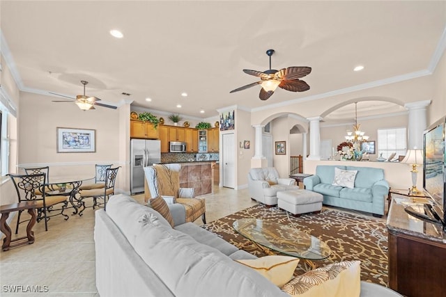 3536 Cherry Blossom Ct Unit 201, Estero, FL 33928 - living room with ornate columns, ceiling fan, arched walkways, crown molding, and recessed lighting