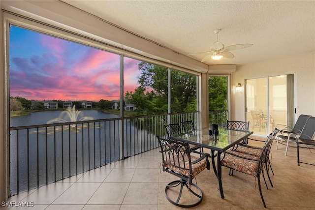 3536 Cherry Blossom Ct Unit 201, Estero, FL 33928 - sunroom featuring a water view