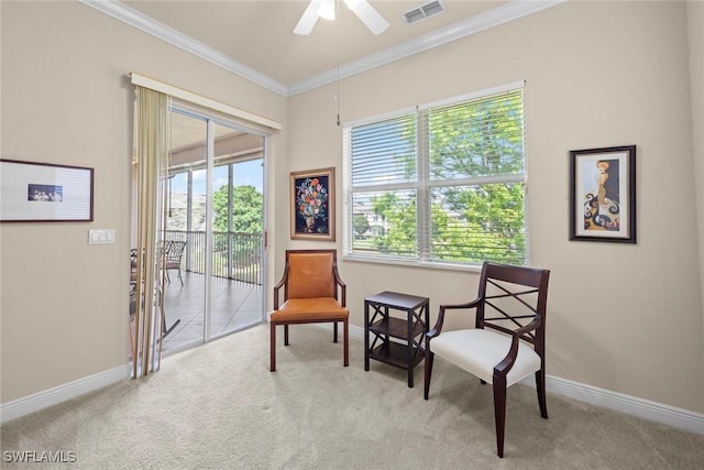 3536 Cherry Blossom Ct Unit 201, Estero, FL 33928 - living area featuring plenty of natural light, carpet, crown molding, and ceiling fan