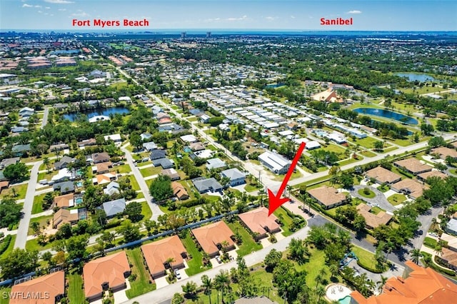 5482 Peppertree Dr, Fort Myers, FL 33908 - bird's eye view featuring a water view and a residential view