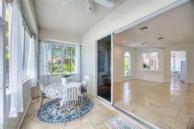5482 Peppertree Dr, Fort Myers, FL 33908 - sunroom / solarium featuring stone tile flooring, baseboards, and visible vents