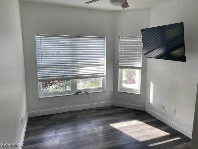 8860 Banyan Cove Cir S Unit 0, Fort Myers, FL 33919 - spare room with a ceiling fan, baseboards, and wood finished floors