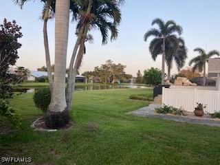 8860 Banyan Cove Cir S Unit 0, Fort Myers, FL 33919 - view of green lawn featuring a water view
