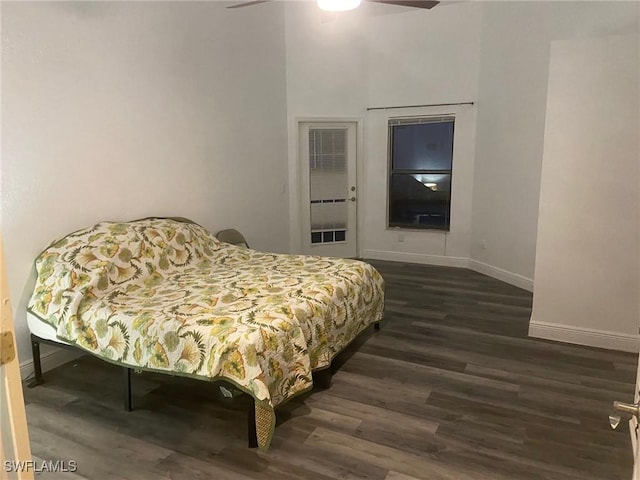 8860 Banyan Cove Cir S Unit 0, Fort Myers, FL 33919 - bedroom with dark wood-style floors, baseboards, and ceiling fan