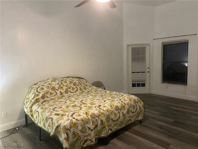 8860 Banyan Cove Cir S Unit 0, Fort Myers, FL 33919 - bedroom with baseboards, dark wood finished floors, and a ceiling fan