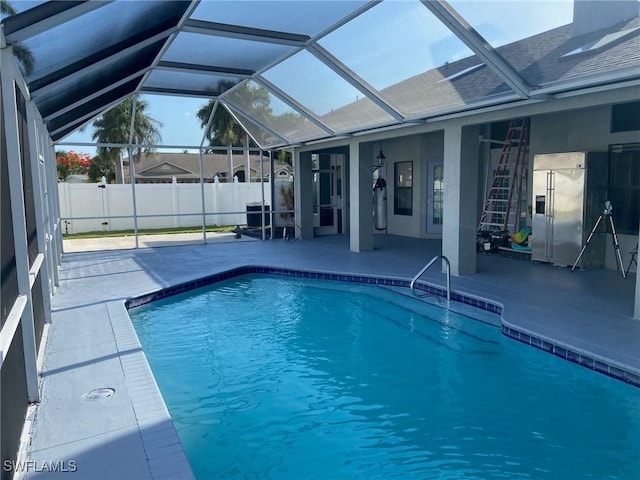 8860 Banyan Cove Cir S Unit 0, Fort Myers, FL 33919 - view of pool featuring a patio area and a lanai