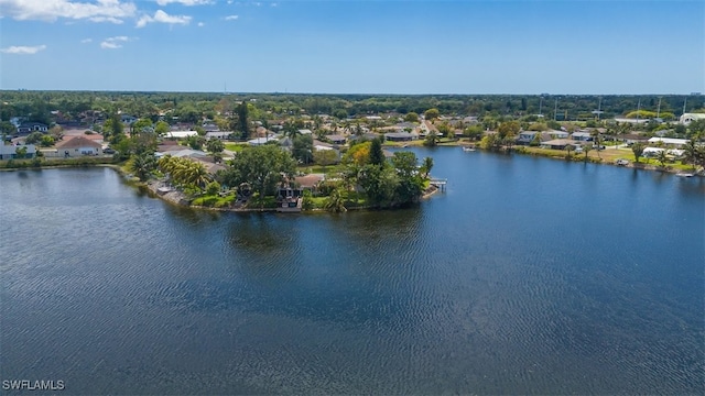 birds eye view of property featuring a residential view and a water view