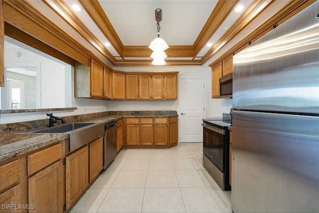 kitchen featuring stainless steel appliances, a sink, ornamental molding, brown cabinetry, and light tile patterned floors