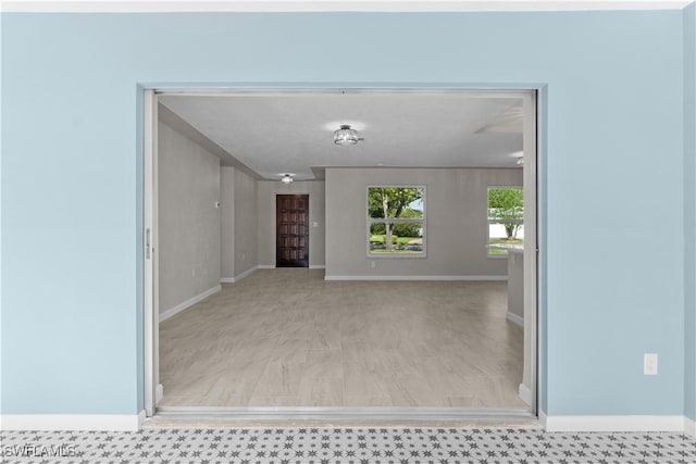 interior space with baseboards