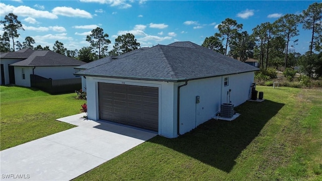 garage with concrete driveway