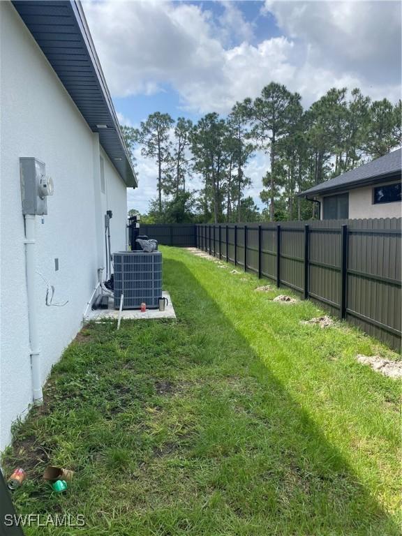 view of yard featuring cooling unit