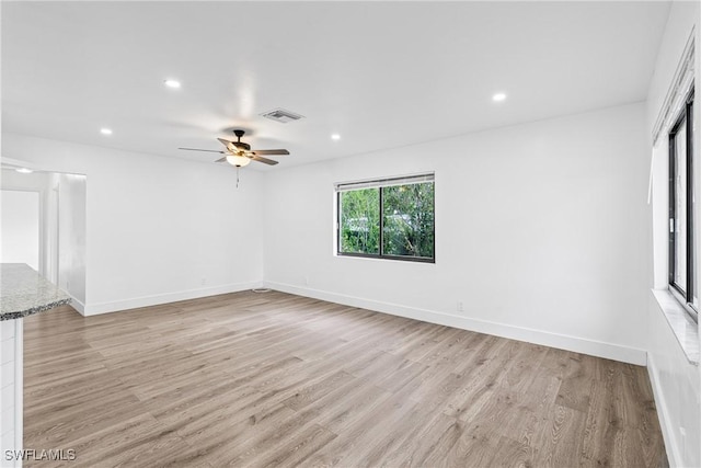 3433 Hibiscus Ave, Naples, FL 34104 - unfurnished room featuring visible vents, baseboards, ceiling fan, recessed lighting, and light wood finished floors