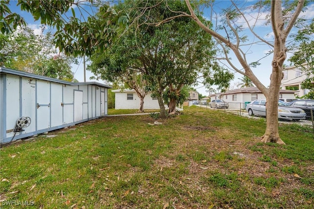 3433 Hibiscus Ave, Naples, FL 34104 - view of yard featuring an outdoor structure