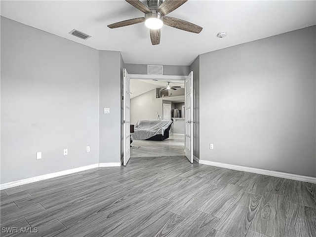 2732 NW 3rd Ter, Cape Coral, FL 33993 - unfurnished bedroom featuring baseboards, a ceiling fan, and visible vents