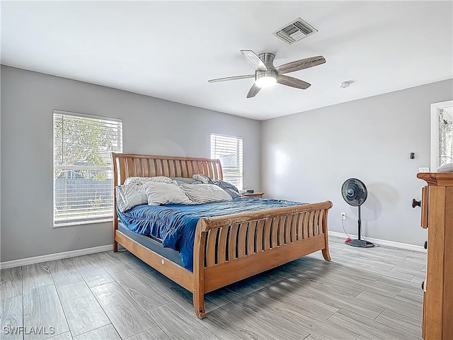 2732 NW 3rd Ter, Cape Coral, FL 33993 - bedroom featuring visible vents, baseboards, light wood-type flooring, and a ceiling fan