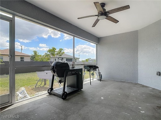 2732 NW 3rd Ter, Cape Coral, FL 33993 - exercise room with a textured wall and ceiling fan