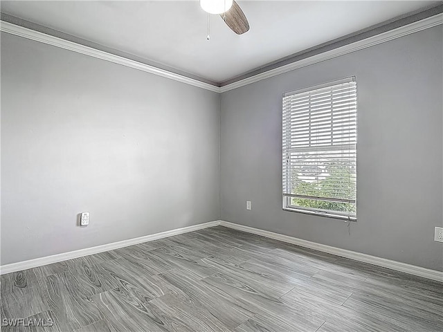 2732 NW 3rd Ter, Cape Coral, FL 33993 - empty room featuring crown molding, baseboards, and a ceiling fan