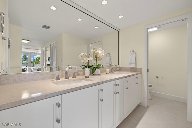 4031 Gulf Shore Blvd N Unit 3E, Naples, FL 34103 - full bath featuring toilet, tile patterned floors, double vanity, and a sink