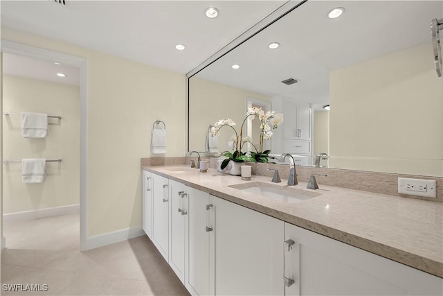 4031 Gulf Shore Blvd N Unit 3E, Naples, FL 34103 - bathroom with a sink, tile patterned flooring, baseboards, and recessed lighting