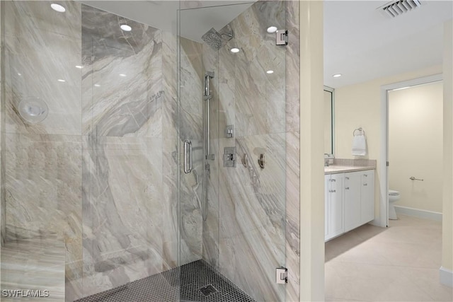 4031 Gulf Shore Blvd N Unit 3E, Naples, FL 34103 - full bath with vanity, tile patterned flooring, visible vents, toilet, and a marble finish shower
