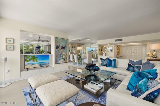 4031 Gulf Shore Blvd N Unit 3E, Naples, FL 34103 - living room featuring visible vents, ceiling fan, plenty of natural light, and baseboards