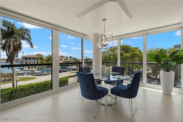 4031 Gulf Shore Blvd N Unit 3E, Naples, FL 34103 - sunroom / solarium featuring an inviting chandelier