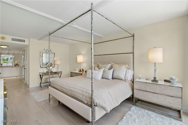 4031 Gulf Shore Blvd N Unit 3E, Naples, FL 34103 - bedroom featuring wood finished floors, baseboards, and visible vents