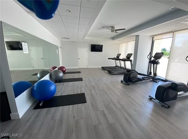 4031 Gulf Shore Blvd N Unit 3E, Naples, FL 34103 - workout area with wood finished floors, ceiling fan, and baseboards