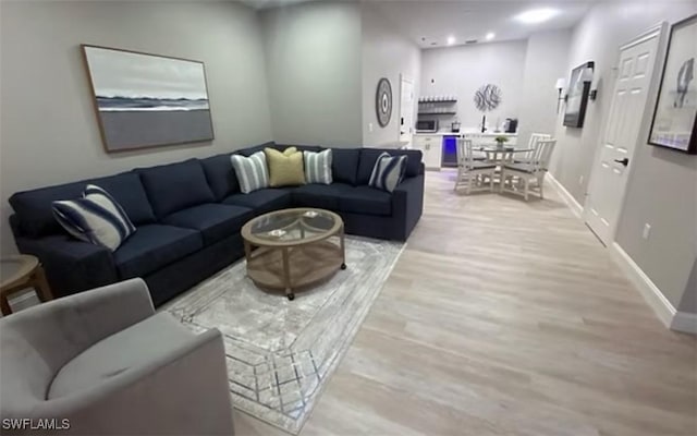4031 Gulf Shore Blvd N Unit 3E, Naples, FL 34103 - living room featuring light wood finished floors, baseboards, and recessed lighting