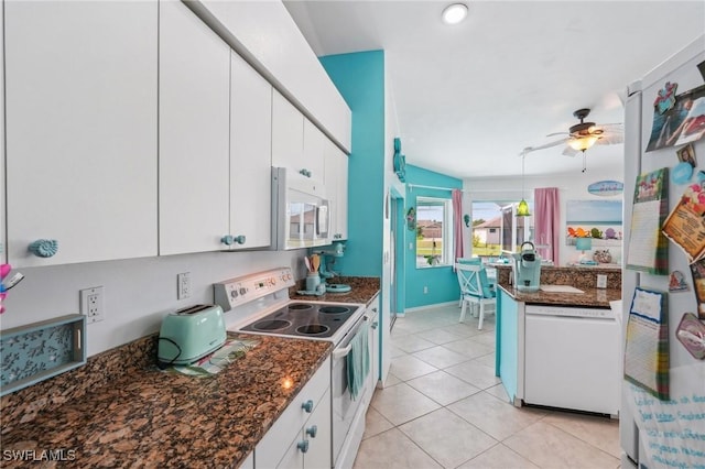 kitchen featuring white cabinets, white appliances, a ceiling fan, and light tile patterned floors