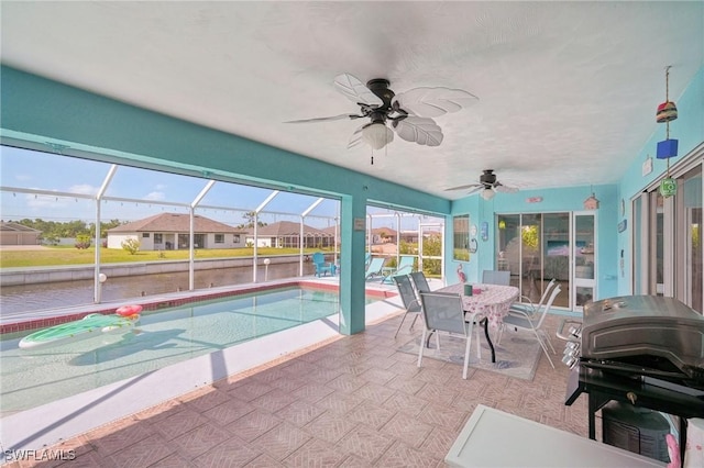 exterior space with a patio, a lanai, and ceiling fan