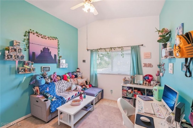 bedroom with ceiling fan, baseboards, tile patterned flooring, and vaulted ceiling