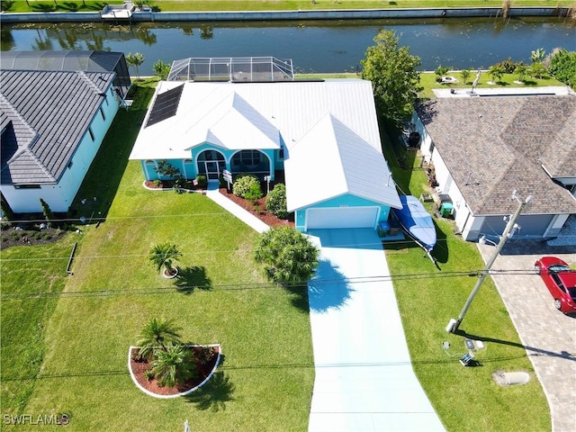 birds eye view of property featuring a water view