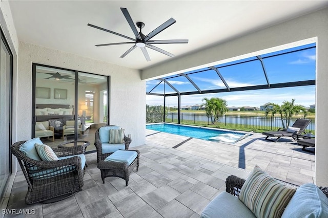 11477 Canopy Loop, Fort Myers, FL 33913 - outdoor pool featuring a patio, a water view, a ceiling fan, glass enclosure, and an outdoor hangout area