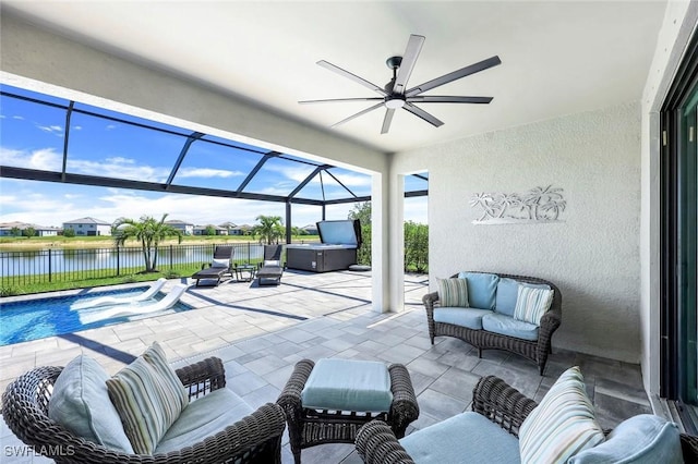 11477 Canopy Loop, Fort Myers, FL 33913 - view of patio / terrace featuring a hot tub, an outdoor living space, a ceiling fan, and a lanai