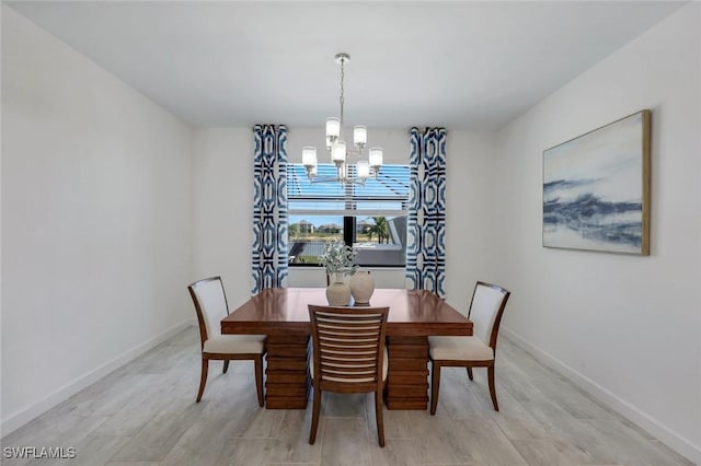 11477 Canopy Loop, Fort Myers, FL 33913 - dining space featuring a chandelier and baseboards