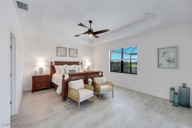 11477 Canopy Loop, Fort Myers, FL 33913 - bedroom with a raised ceiling, baseboards, and ceiling fan