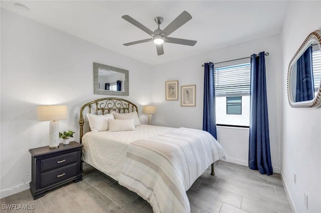 11477 Canopy Loop, Fort Myers, FL 33913 - bedroom with baseboards and ceiling fan