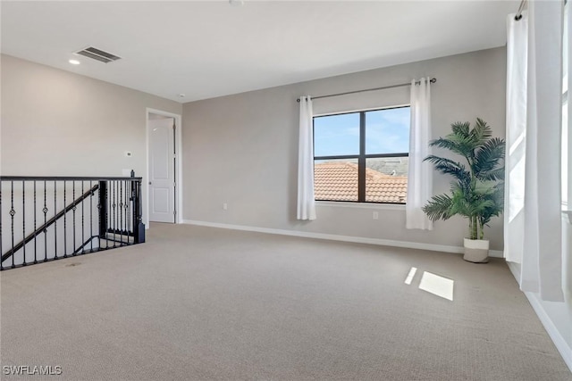 7175 Wilton Dr, Naples, FL 34109 - unfurnished room featuring carpet flooring, visible vents, and baseboards
