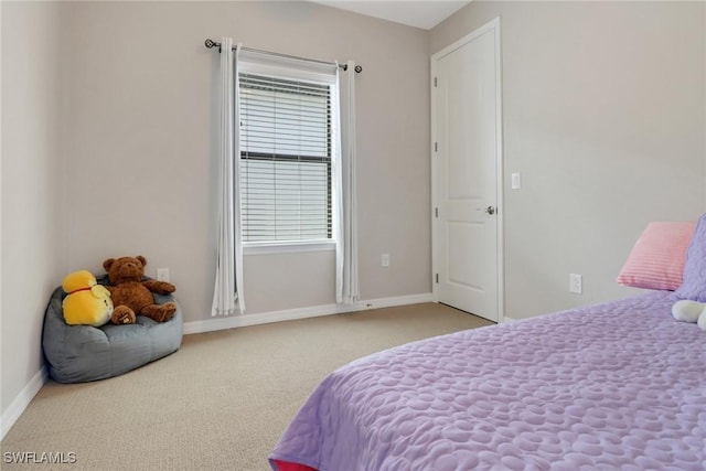 7175 Wilton Dr, Naples, FL 34109 - bedroom featuring baseboards and carpet