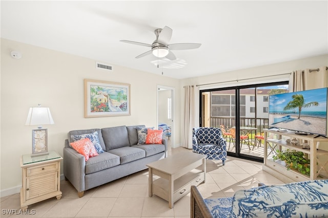 671 E Gulf Dr Unit 2C2, Sanibel, FL 33957 - living area with visible vents, baseboards, a ceiling fan, and light tile patterned floors